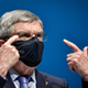 Here we see IOC President Thomas Bach wearing a mask because he knows exactly how dangerous COVID is and how easily it spreads.